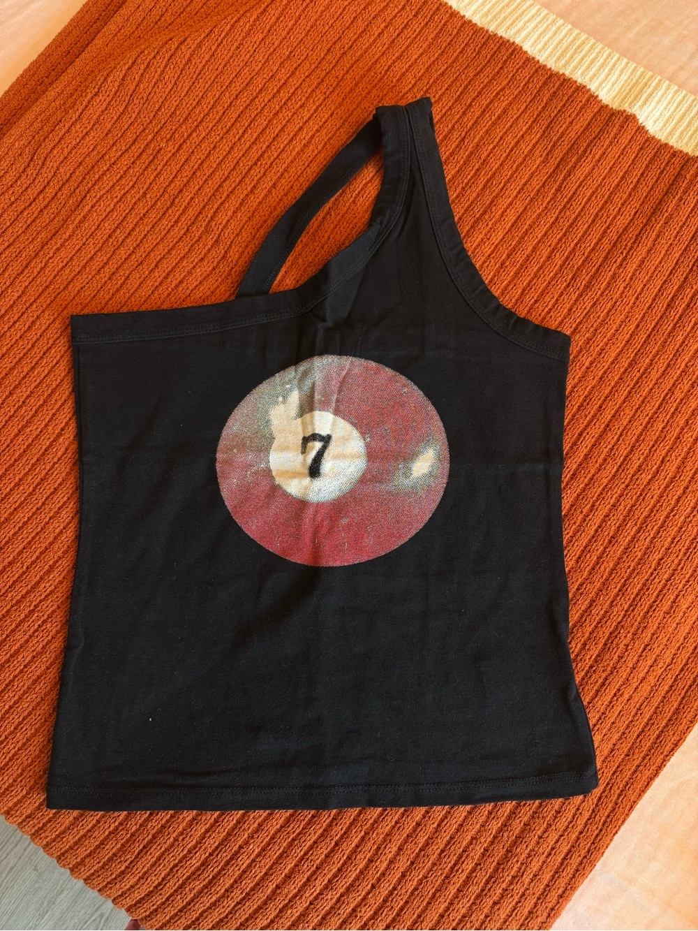 Project Social Black One-Shoulder Women’s Tank Top with 7 Ball Graphic